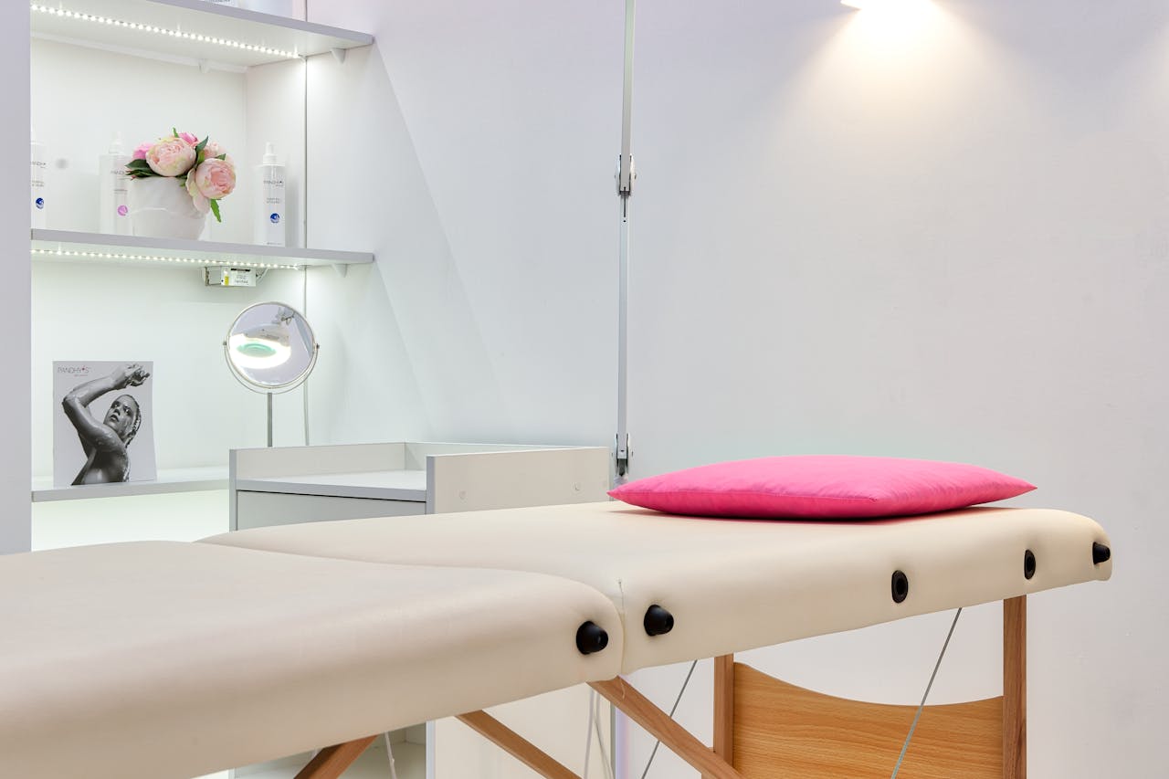 Mastering the First Impression: Your intriguing post title goes here Interior of modern beauty office with couch for skincare procedures under glowing light